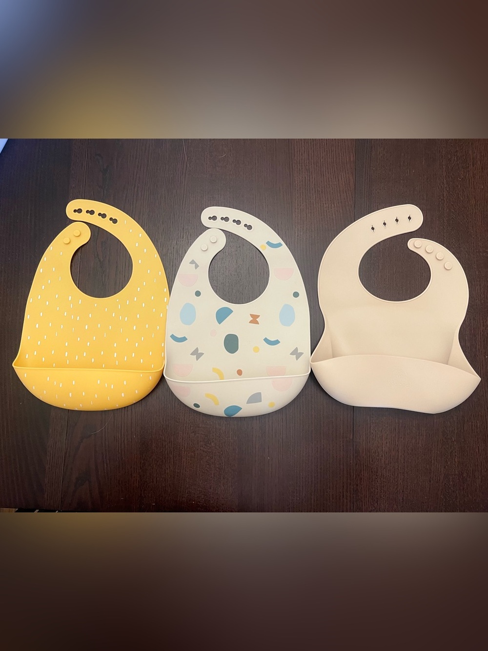 cloud island and Kiddibodi Silicone Bibs in Yellow, Multicolor, and Cream